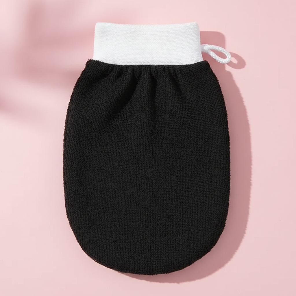 Gant exfoliant noir - fond pastel
